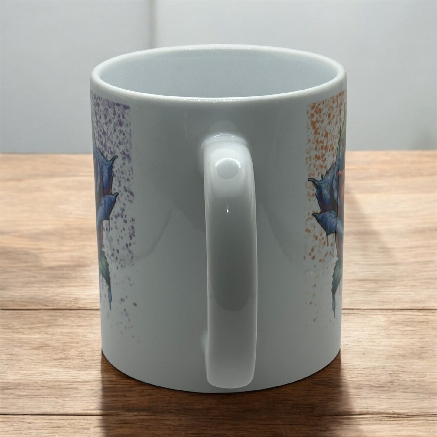 11 ounce white sublimated mug with Rainbow splatter on Rainbow dripping rose