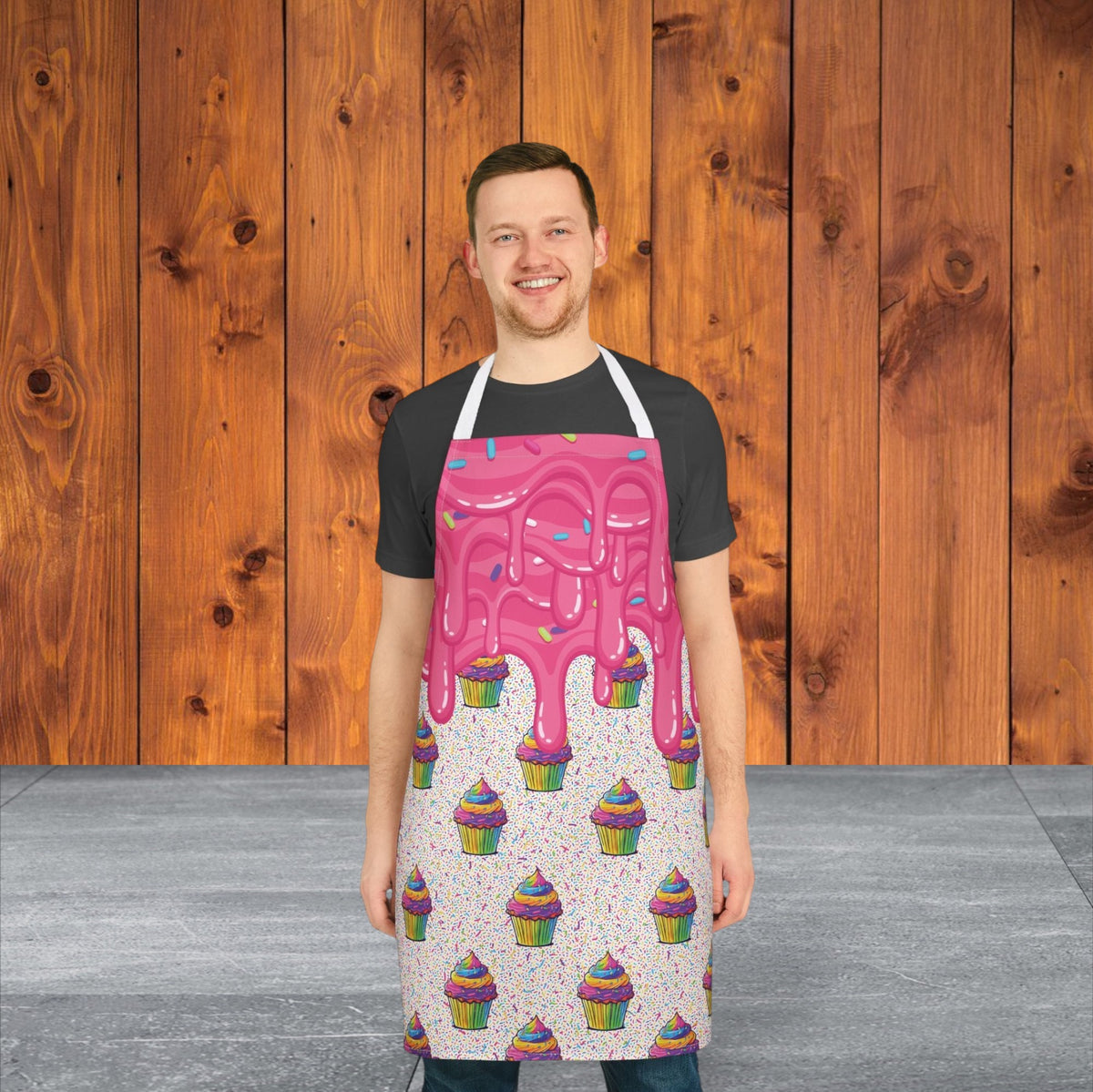 Jamrozy's Limited Company chef apron featuring a pink cupcake icing drip pattern on a white polyester canvas base.